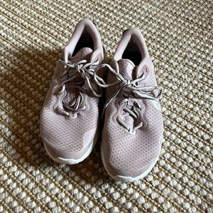 Pink Nike running shoes
